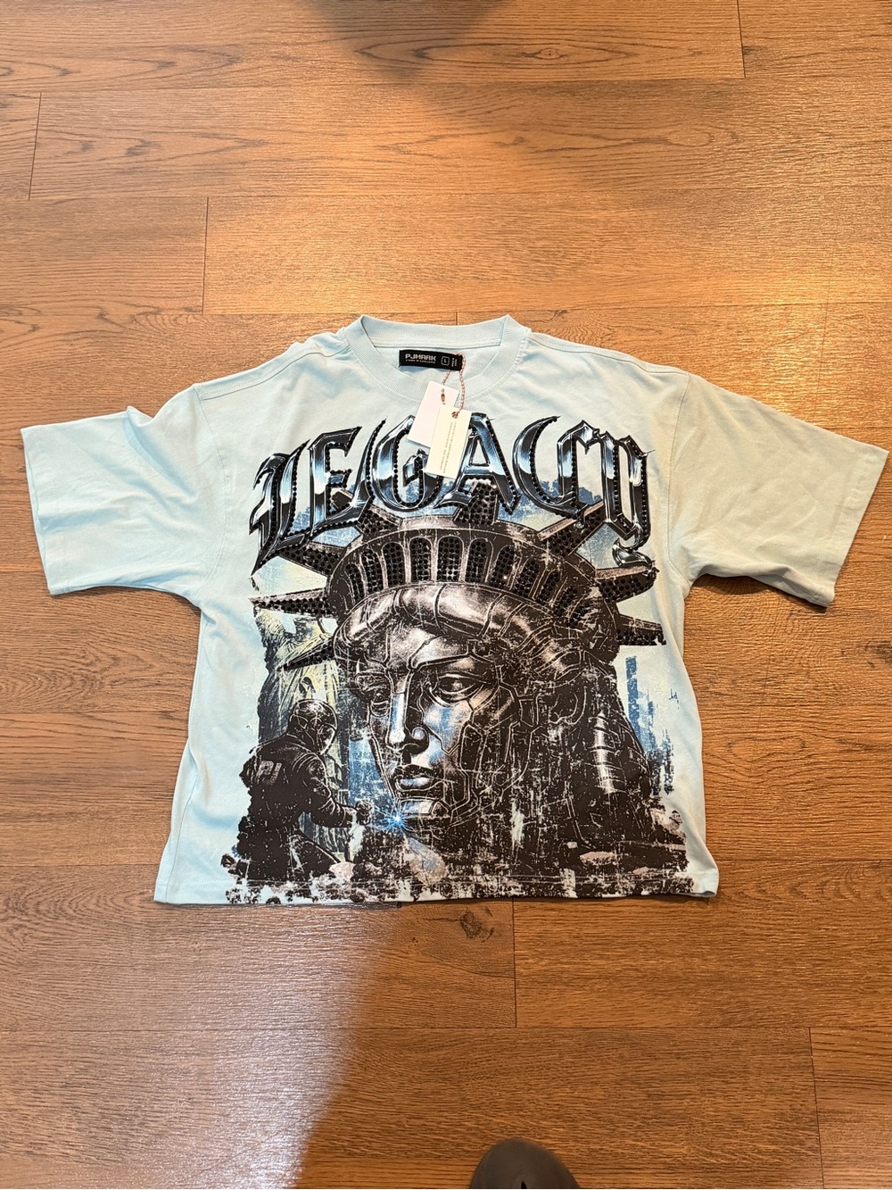Legacy Light Blue Graphic Tee with Statue of Liberty Print